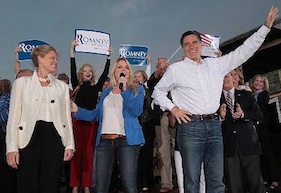 Dana Swanson in the back holding Romney sign during Ormond visit / Headline Surfer